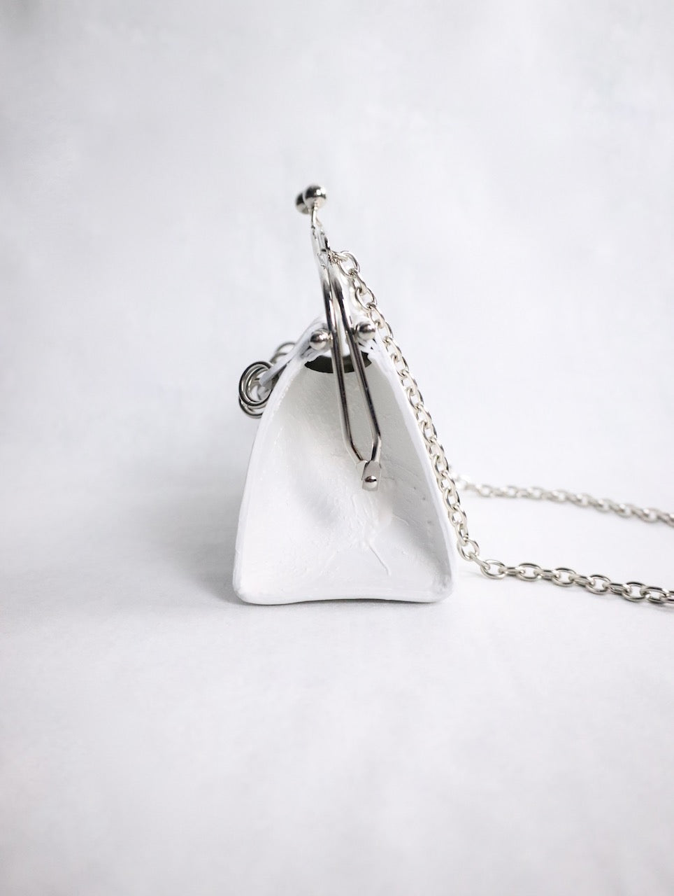 kagari yusuke chatelaine bag white
