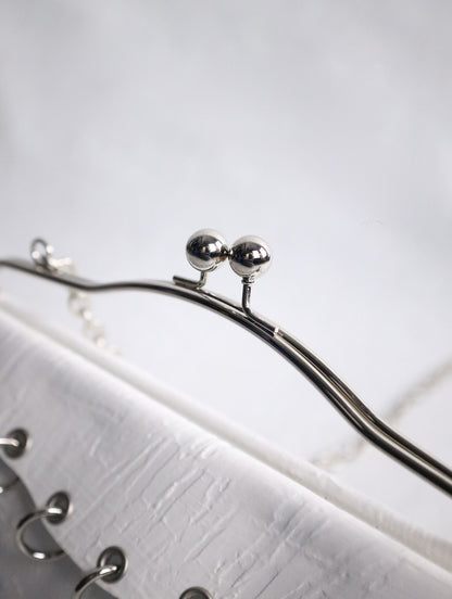 kagari yusuke chatelaine bag white