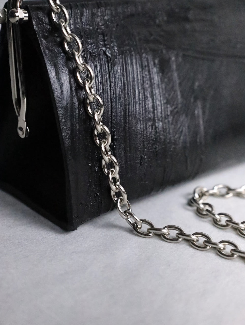kagari yusuke chatelaine bag black