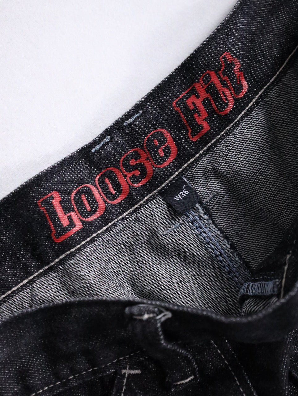 three-quarter length cargo denim pants black